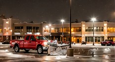 Illustrative red snowplow truck scene 6